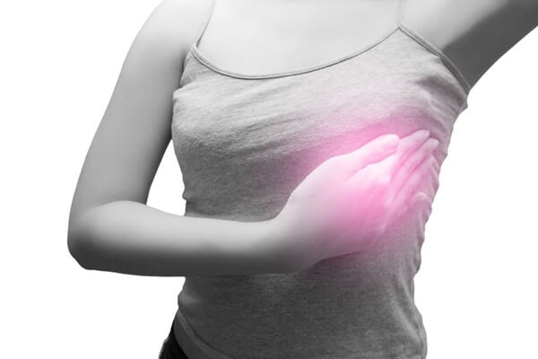 هل ألم الثدي بعد التبويض من علامات الحمل